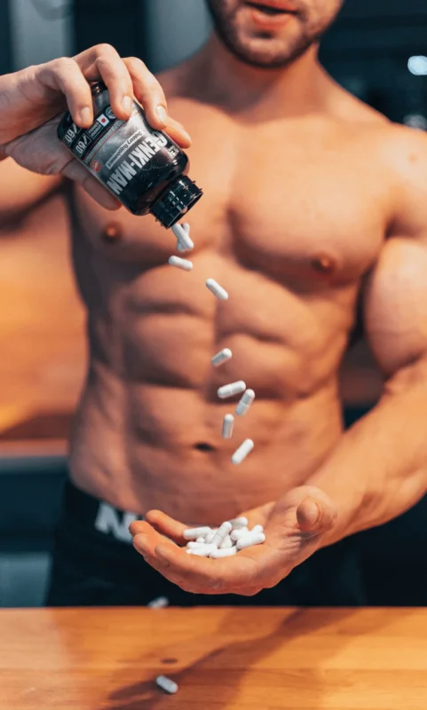 Genki-Man supplement poured by muscular man